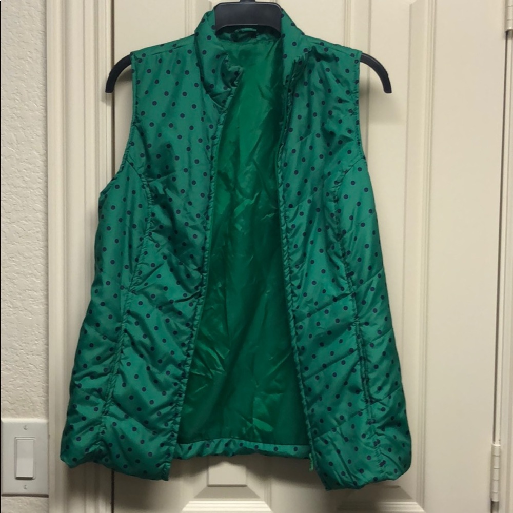 Green and blue polka dot puffer vest with pockets